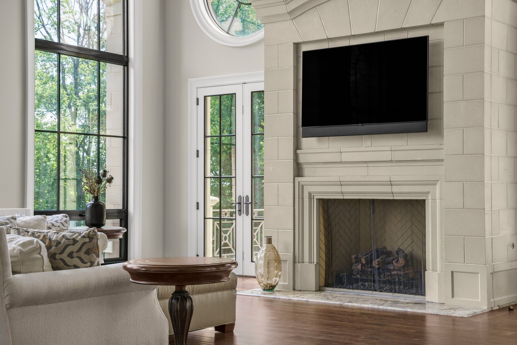 great room with fireplace and soaring ceilings at The Somerset
